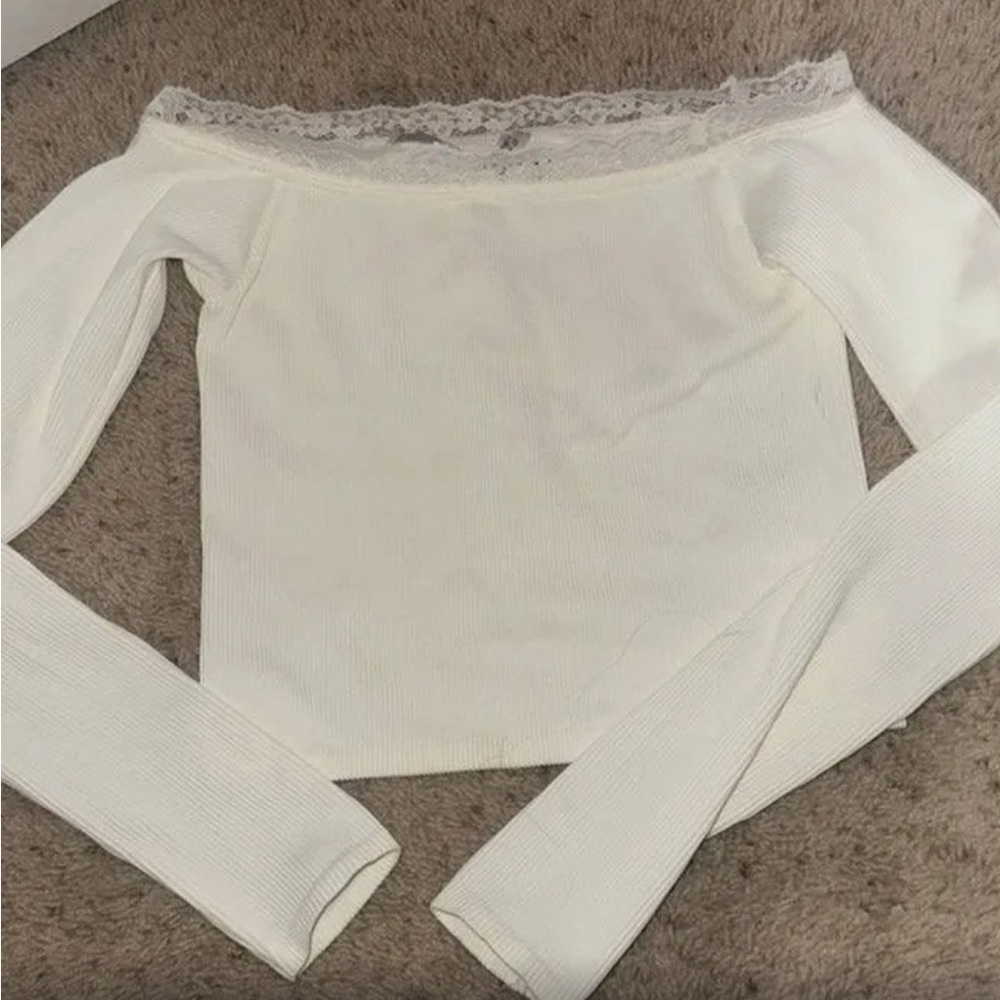 White staple off the shoulder shirt